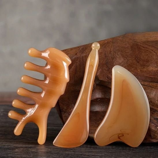 gua sha peigne, stylo, dent
