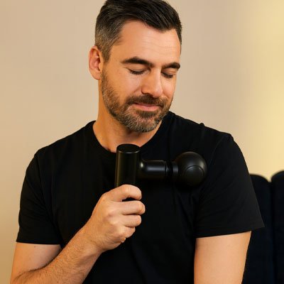 Pistolet de massage épaule homme